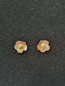 Solvända örhänge fasta liten 18K 