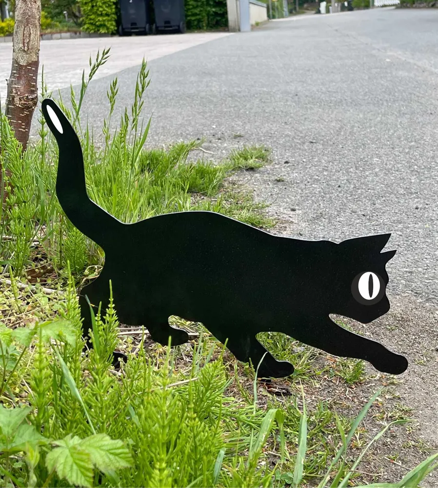 Reflexkatt i svartlackerat stål
